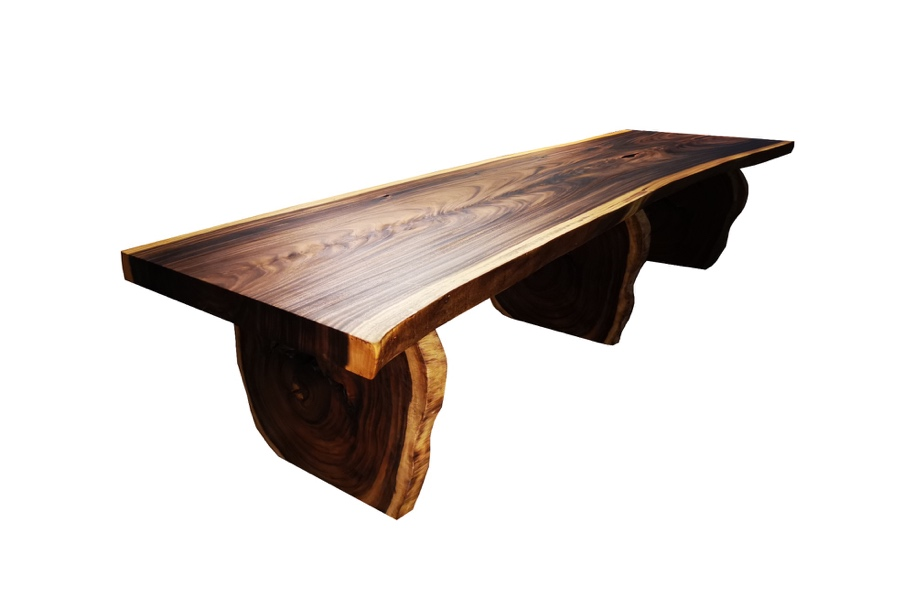 A wooden table with a live edge