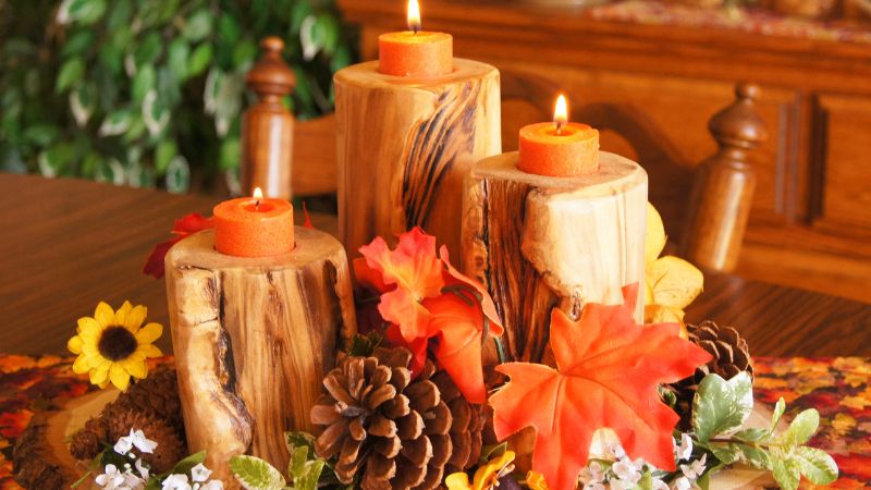 candles and wood on a table