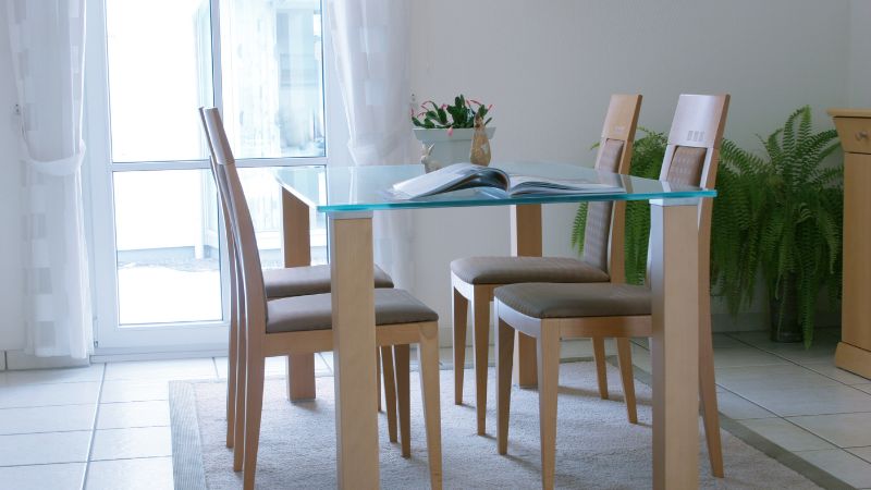 A woden table with glasstop