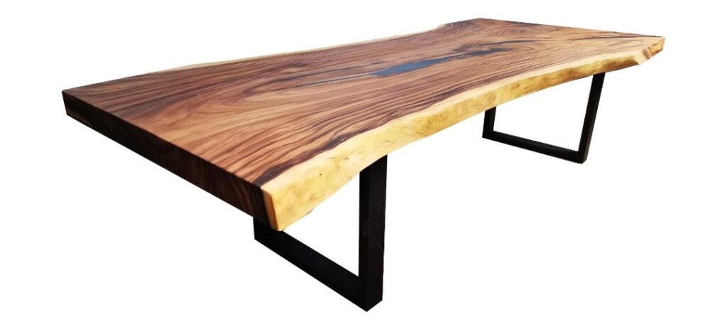 Handcrafted wooden table in acacia