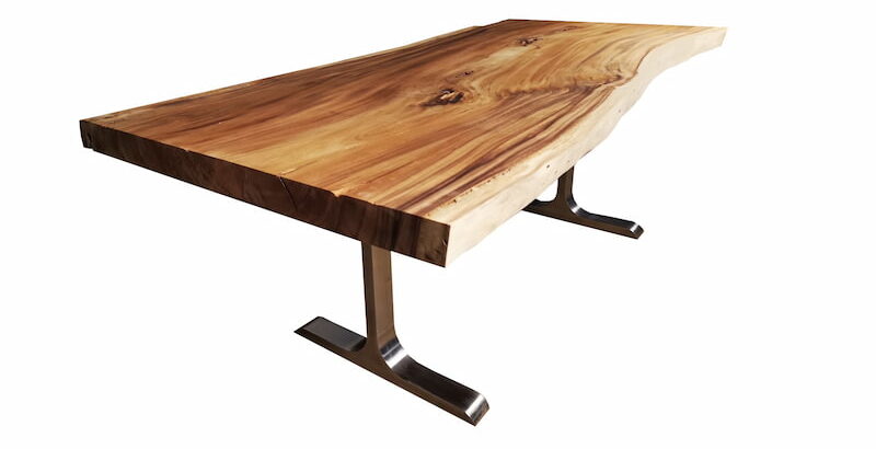 Acacia wood live edge dining table features a tabletop with live edge detailing on the sides. It also has polished metal T-legs