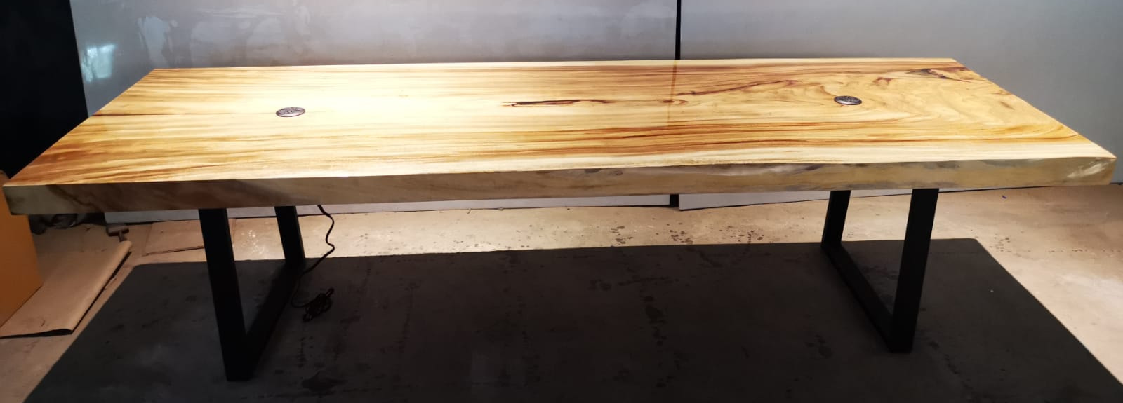 Enhance your work experience with a live edge solid wood table